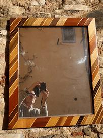 Cornici intarsiate artigianalmente.