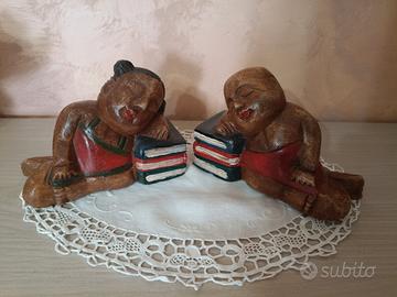 Coppia di sculture etniche bambini in legno 