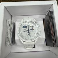 Swatch omega Earthphase Moonshine Gold