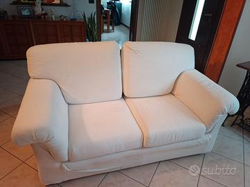 Coppia di divani color avorio