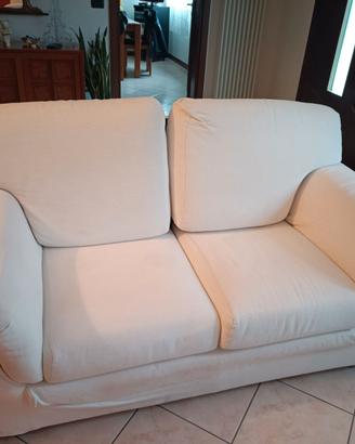 Coppia di divani color avorio