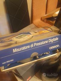 Spazzola elettrica e misuratore di pressione.