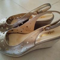 Sandalo Melluso  oro con zeppa 