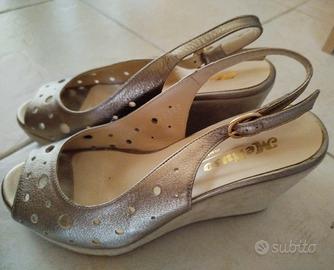 Sandalo Melluso  oro con zeppa 