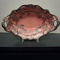 centro tavola in ceramica decorata in argento