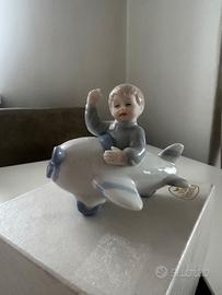 Statuine originali Via Veneto bimbo su aeroplanino