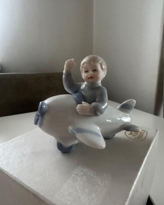 Statuine originali Via Veneto bimbo su aeroplanino