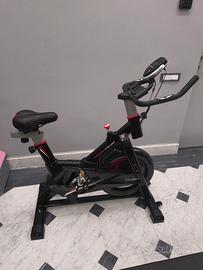 Cyclette mod. Spinning + manubri,dischi,kettlebell