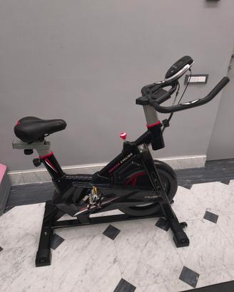 Cyclette mod. Spinning + manubri,dischi,kettlebell