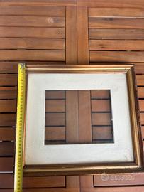 Cornice vintage dorata con passepartout