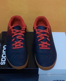 Scarpe da calcio di marca Kipsta 