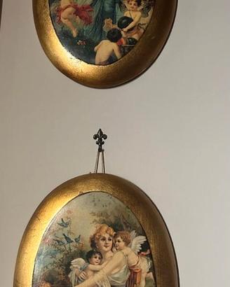 Coppia di quadri ovali vintage con cornice dorata