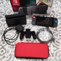Nintendo Switch nera + custodia + 3 giochi