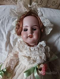 Bambola antica da collezionismo