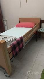 Letto elettrico con telecomando per disabili