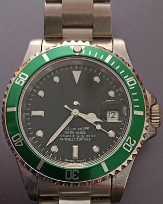 Orologio ghiera verde senza pretese 