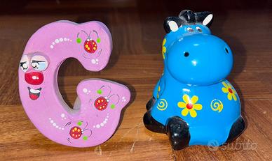 lettera G e salvadanaio