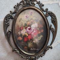 n. 2 quadri ovali con cornice in ottone 