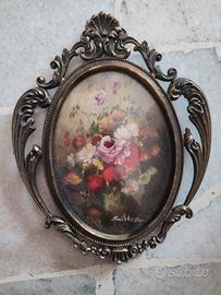 n. 2 quadri ovali con cornice in ottone 