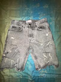 jeans corti strappati