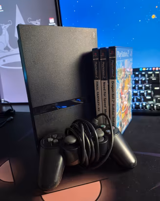PS2 Slim + 3 giochi + controller + memory card