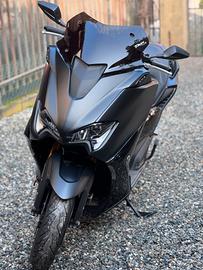 T max 560