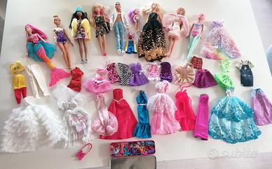 Barbie con vestiti e scarpe