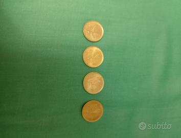 4 monete di valore da 20 lire