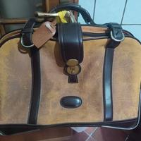 Valigia vintage Pierre Cardin di camoscio e pelle