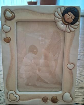 Cornice con angeli e cuori Thun
