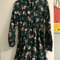 Vestito verde con fantasia floreale