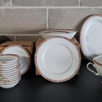 servizio piatti porcellana con decoro al bordo