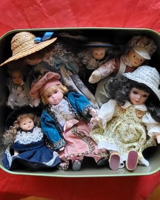 Bambole in miniatura in ceramica