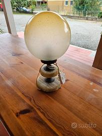 lume con rifiniture in marmo