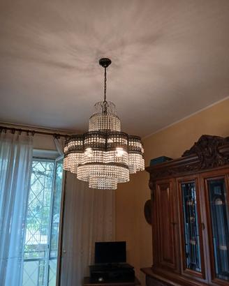 Lampadario in cristallo e ferro battuto