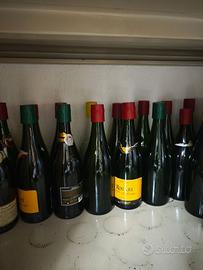 Bottiglie vino vuote e damigiane