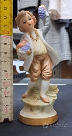 statua capodimonte personaggio con uva 10 cm