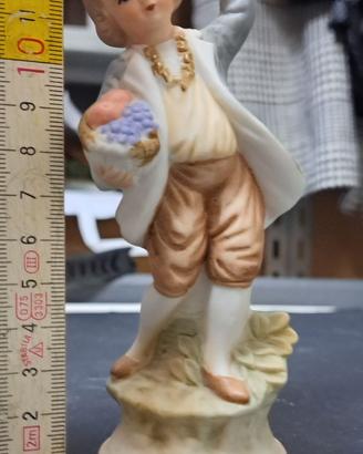 statua capodimonte personaggio con uva 10 cm