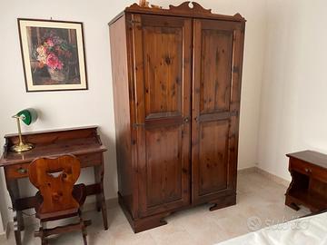 Camera da letto in legno massello