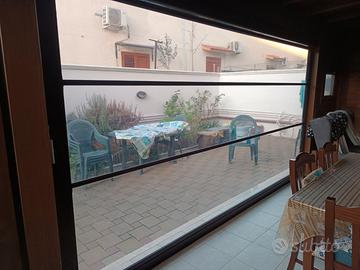 Tenda a rullo steccata antivento motorizzata