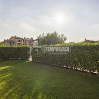 BILOCALE CON GIARDINO IN RESIDENCE CON PISCINA