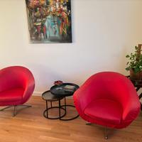 coppia poltrone girevoli egg chair rosse