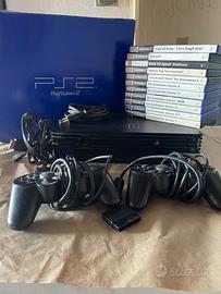 PlayStation 2 scatola originale 2 joypad e giochi