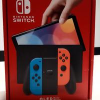 Nintendo Switch OLED  e 4 giochi