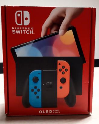 Nintendo Switch OLED  e 4 giochi