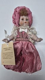 Bambola vintage da collezione in porcellana