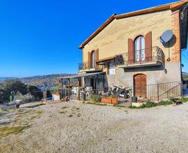 Rigomagno (SI), casa di campagna con terreno