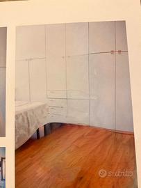 Armadio 10 ante + 4 cassetti