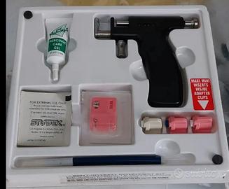pistola orecchini forabuchi