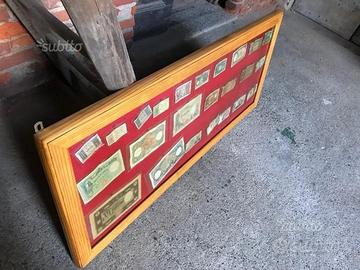 Due quadri porta monete cartacei